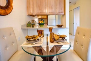 A set table in the dining room of an apartment